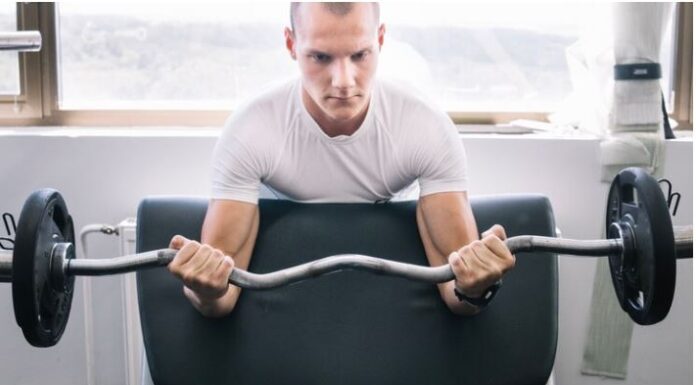 7 Reasons why am I getting weaker in the gym Weak-man-doing-workout